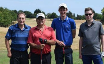 Team of four golfers